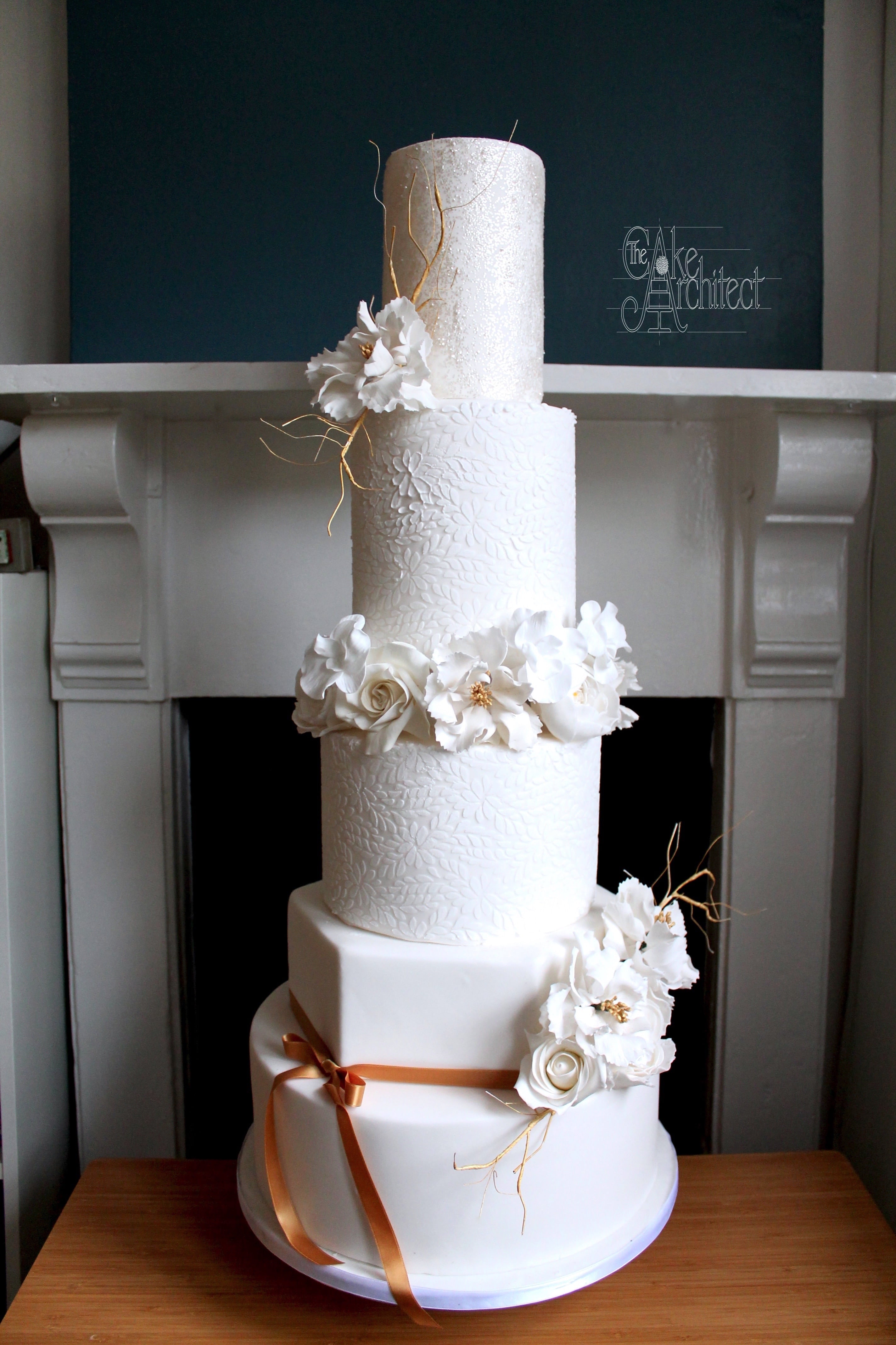 Luxury elegant white wedding cake, 5 tier wedding cake with luxury sugarflowers